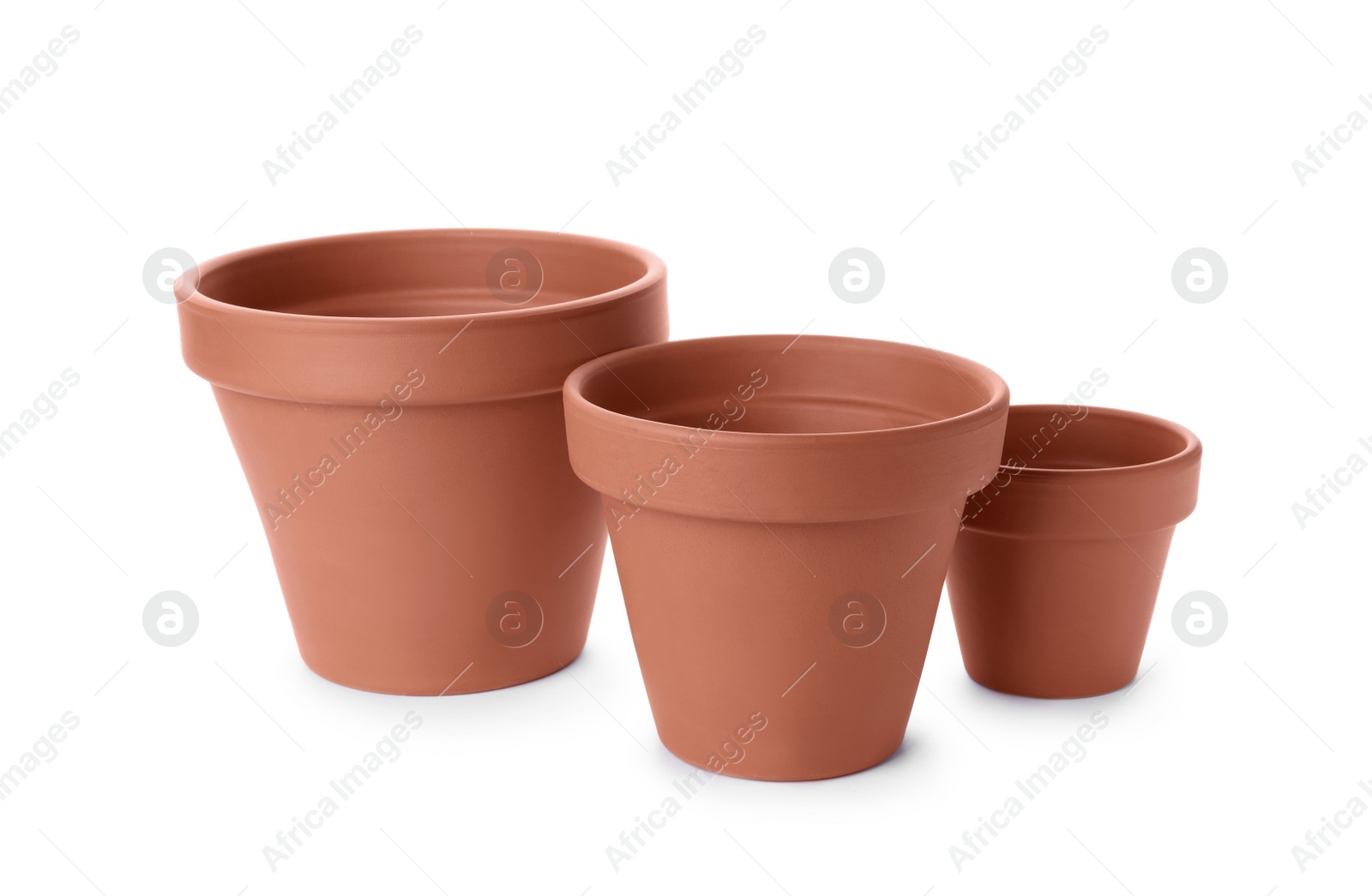 Photo of Stylish terracotta flower pots isolated on white