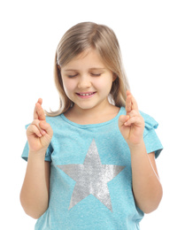 Photo of Cute little girl with crossed fingers on white background
