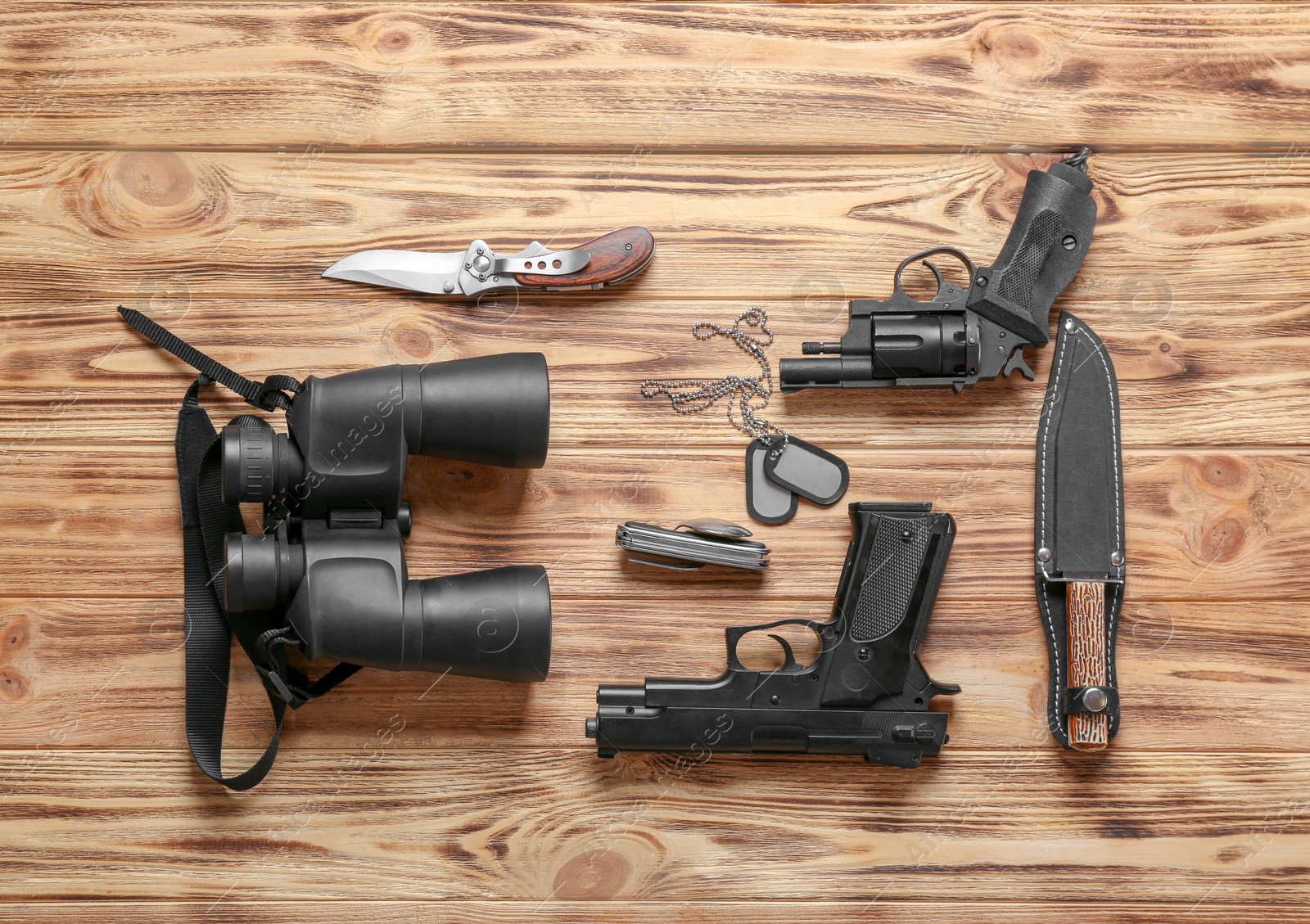 Photo of Set of military outfit on wooden background, flat lay