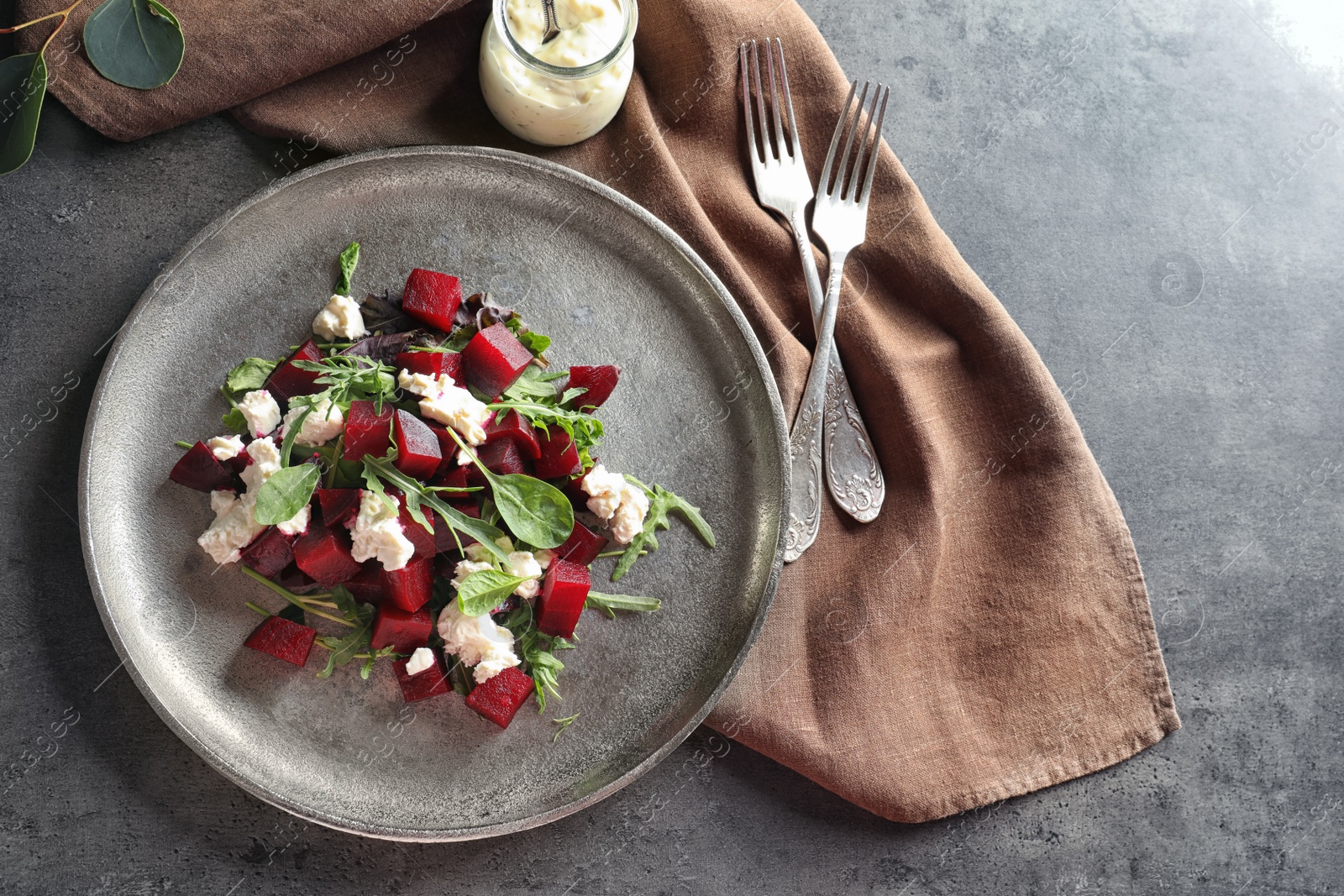 Photo of Plate with delicious beet salad on table, top view