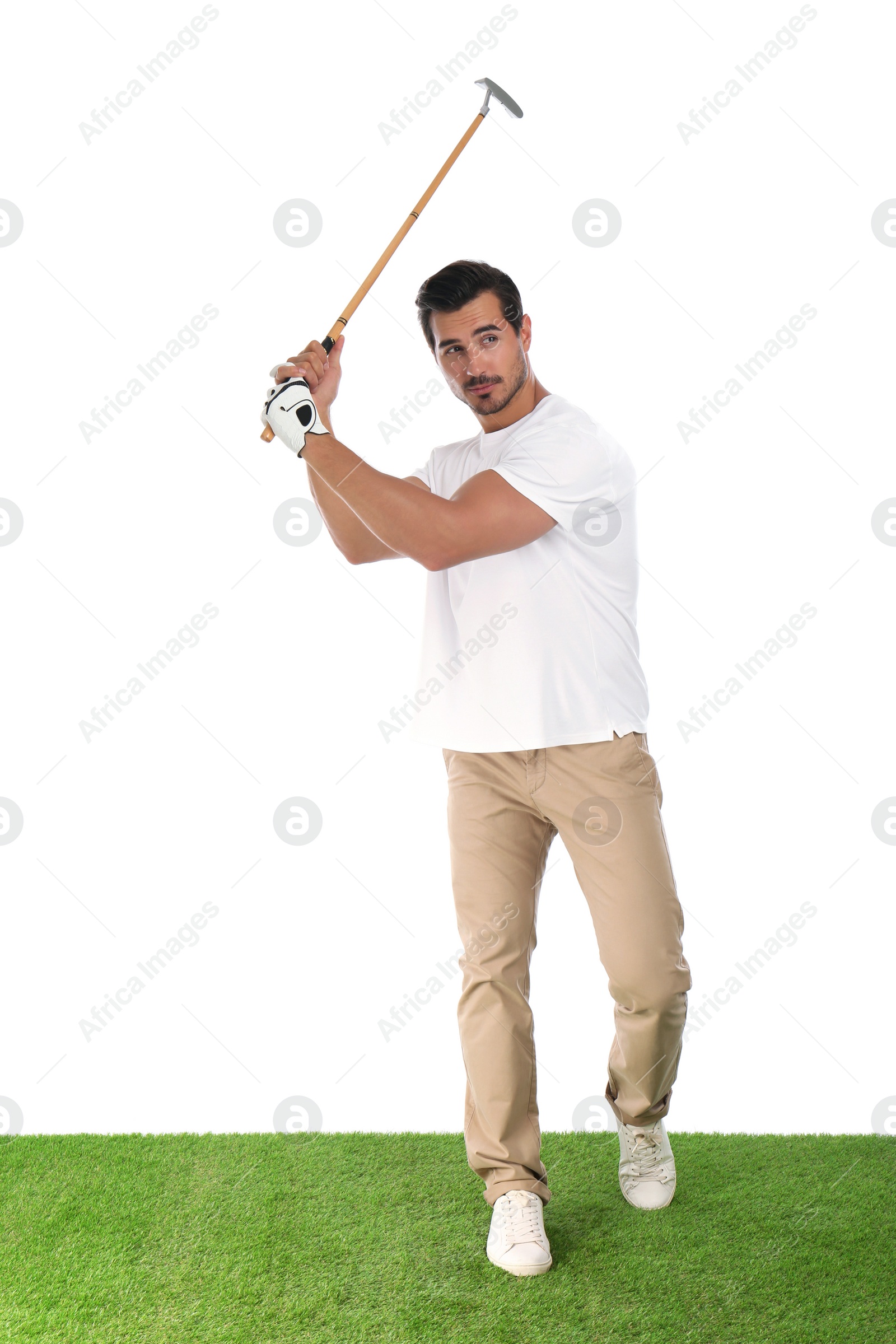 Photo of Young man playing golf on white background