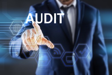 Image of Audit concept. Closeup view of man and different icons on virtual screen