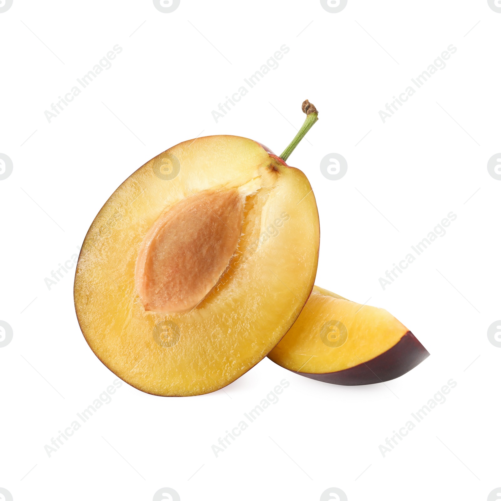 Photo of Pieces of fresh ripe plum on white background