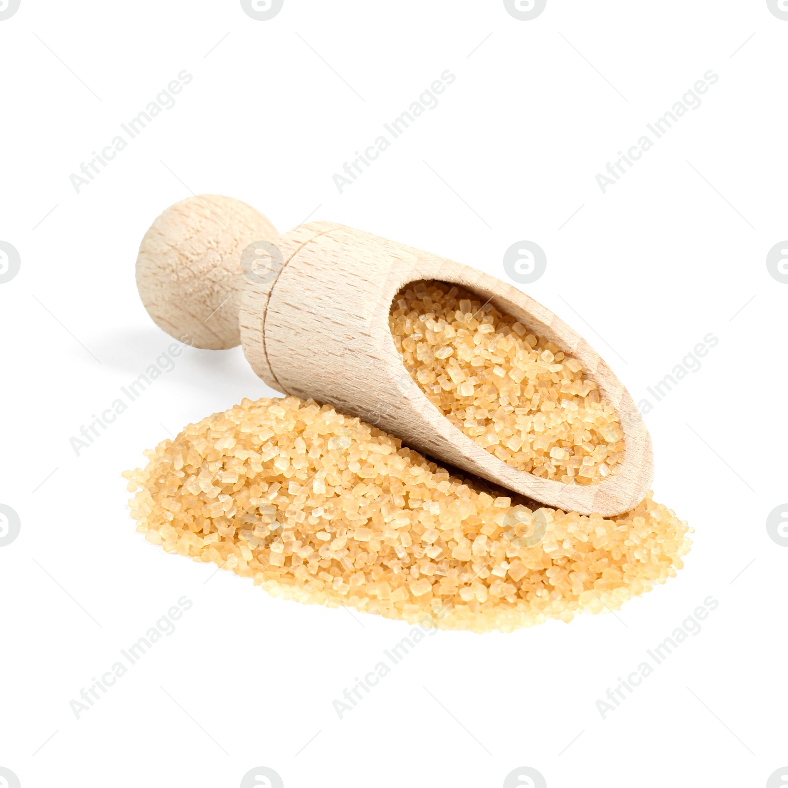 Photo of Pile of brown sugar and wooden scoop isolated on white