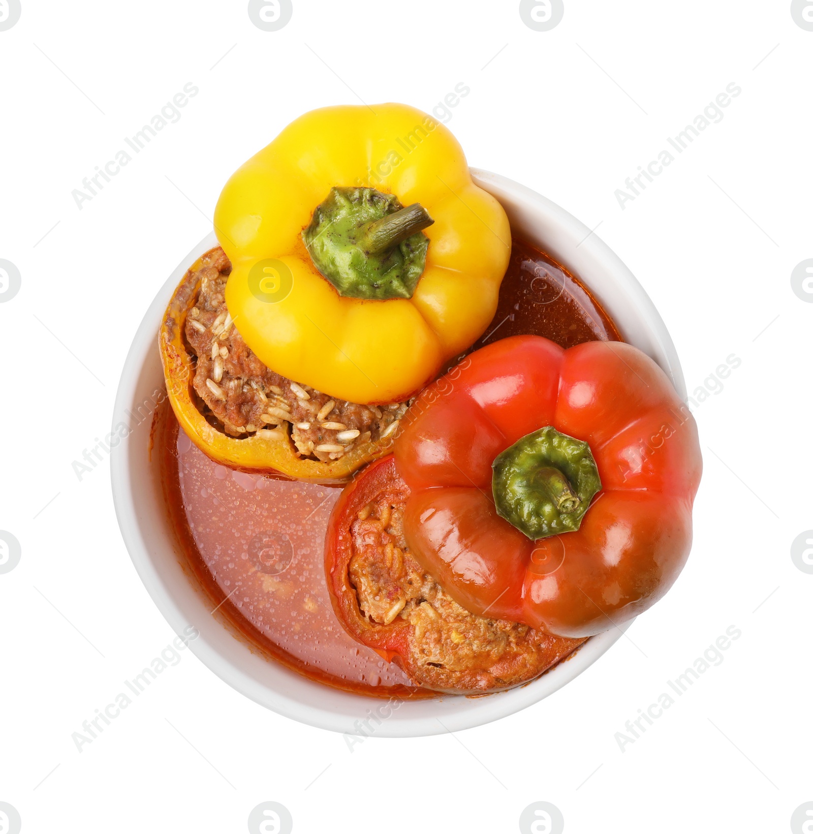 Photo of Delicious stuffed bell peppers isolated on white, top view