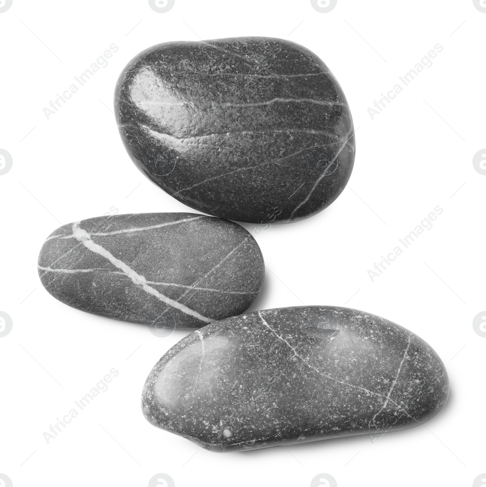 Photo of Group of different stones on white background, top view