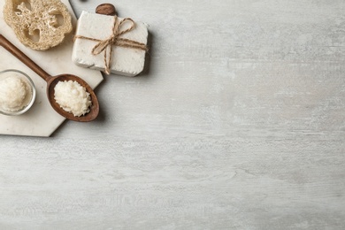 Photo of Flat lay composition with Shea butter and handmade soap on light background. Space for text