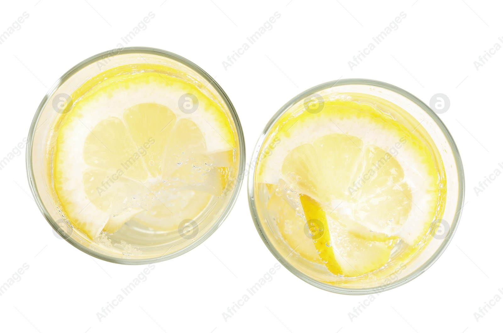 Photo of Soda water with lemon slices on white background, top view
