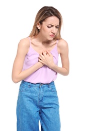 Young woman having heart attack on white background