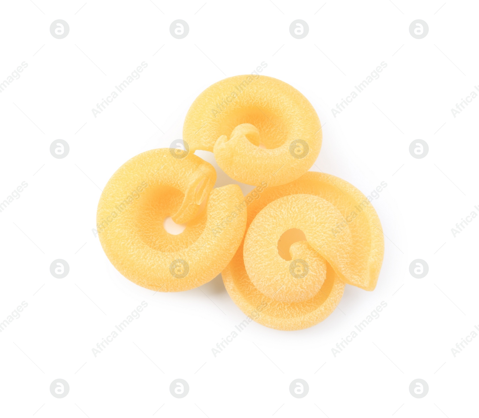 Photo of Raw dischi volanti pasta isolated on white, top view