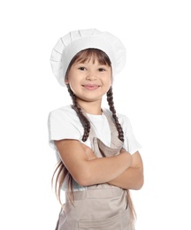 Portrait of little girl in chef hat on white background