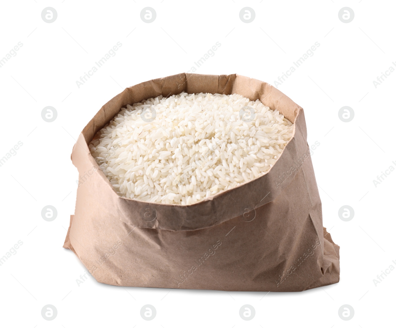 Photo of Uncooked rice in paper bag isolated on white