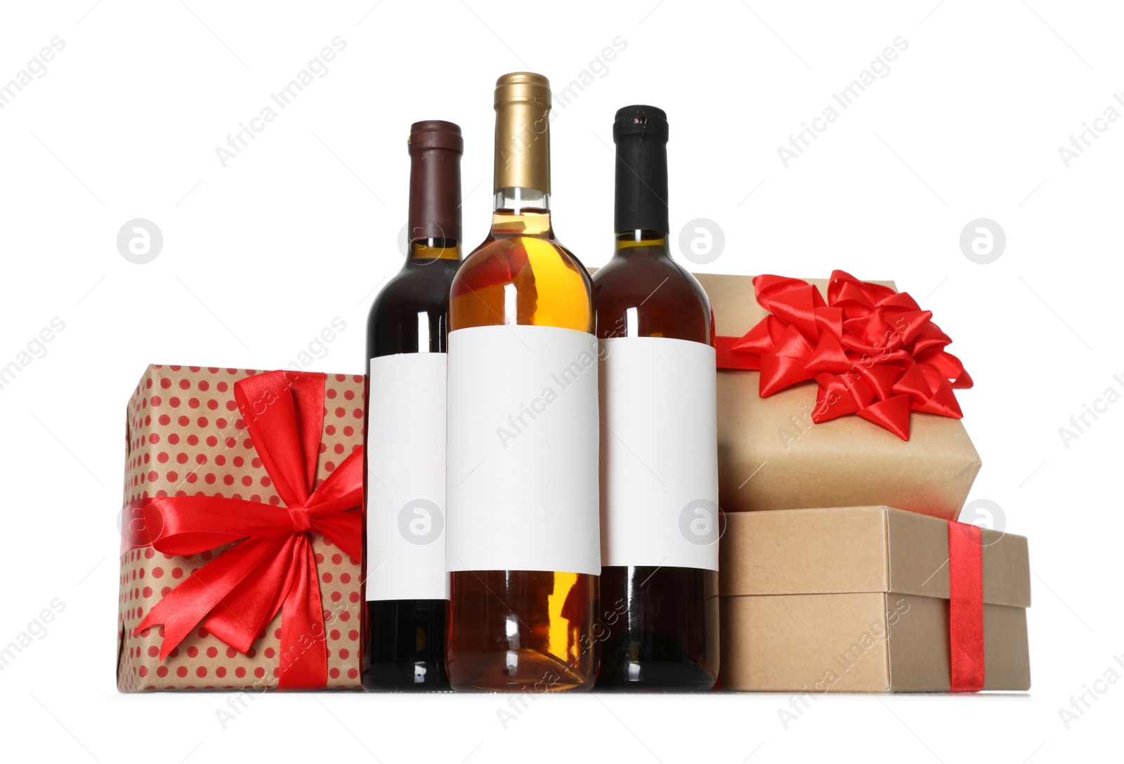 Photo of Bottles of wine and gift boxes on white background