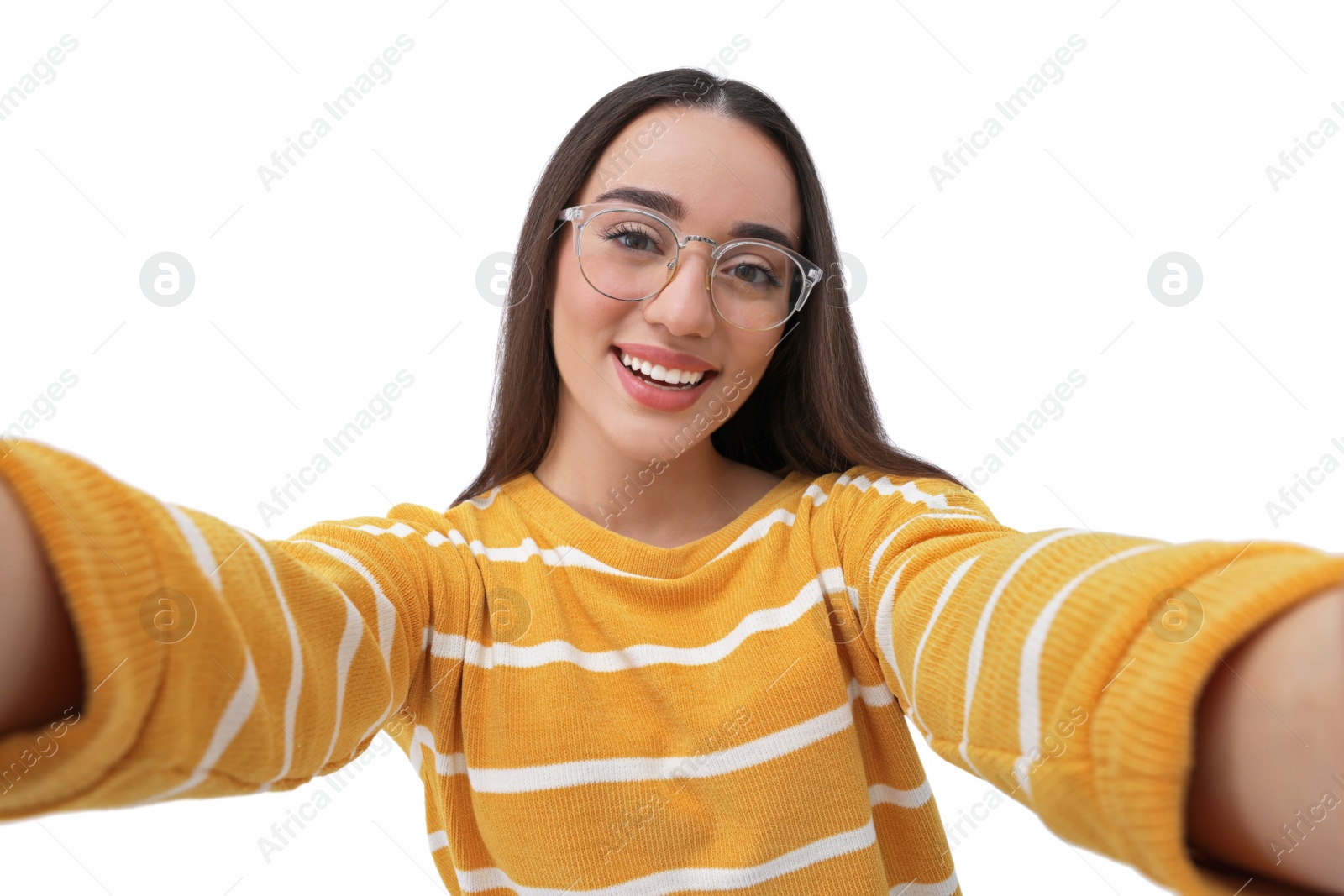 Photo of Smiling young woman taking selfie on white background