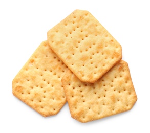 Photo of Delicious crispy crackers isolated on white, top view