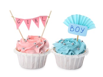 Photo of Baby shower cupcakes with Boy and Girl toppers on white background