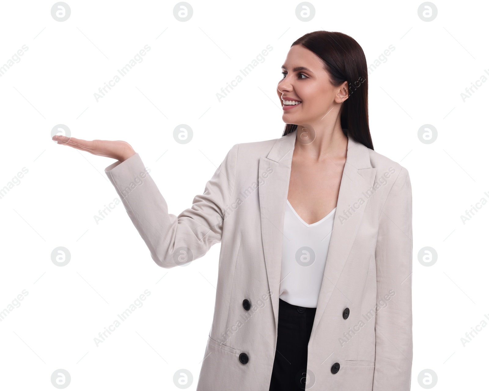 Photo of Beautiful businesswoman in suit pointing at something on white background
