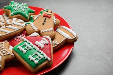 Tasty homemade Christmas cookies on grey table, closeup view. Space for text