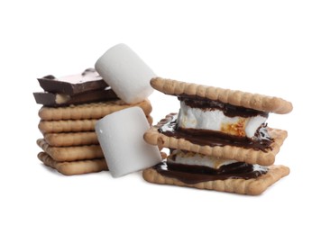 Photo of Delicious marshmallow sandwiches with crackers and chocolate isolated on white