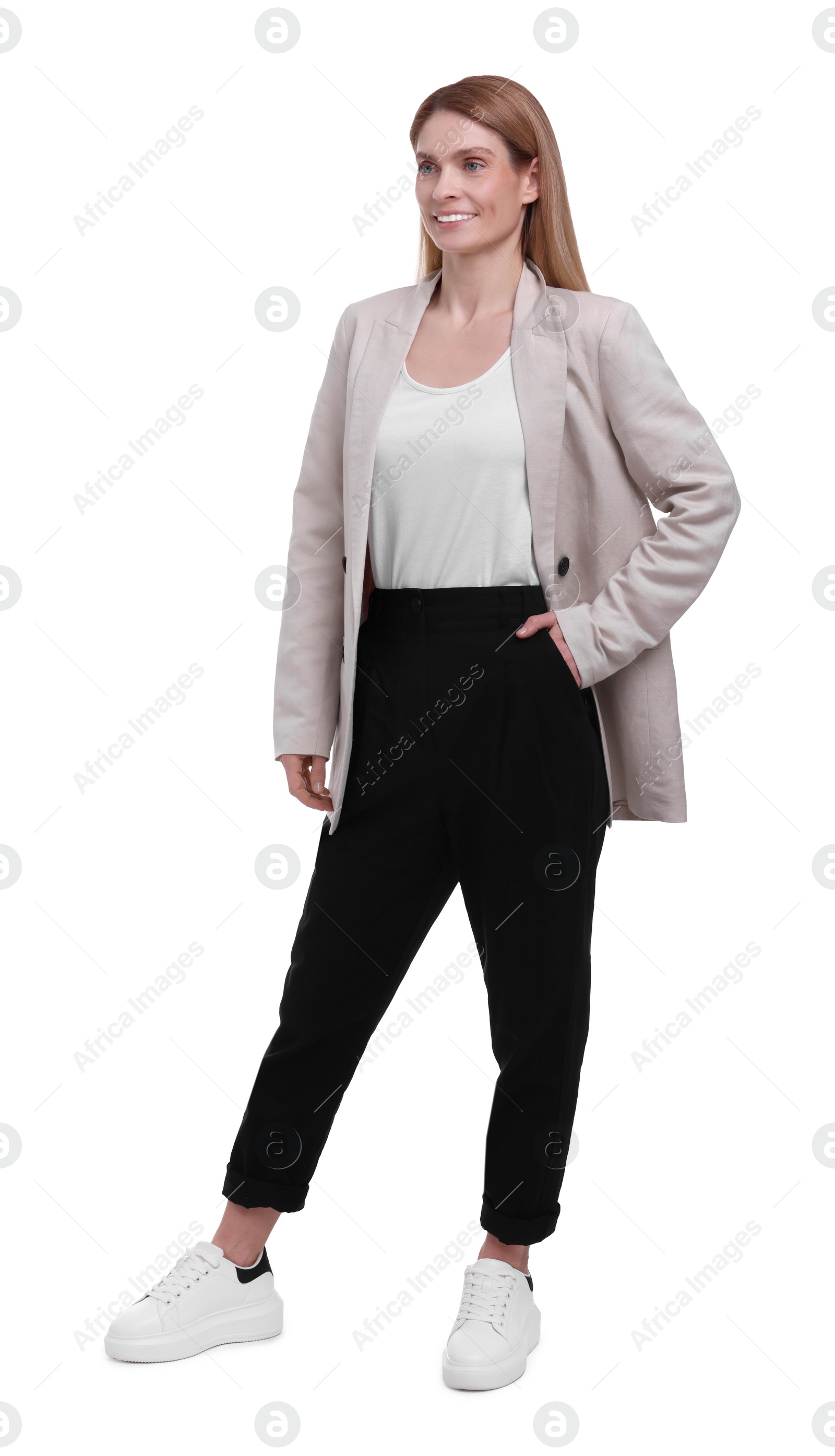 Photo of Beautiful happy businesswoman posing on white background