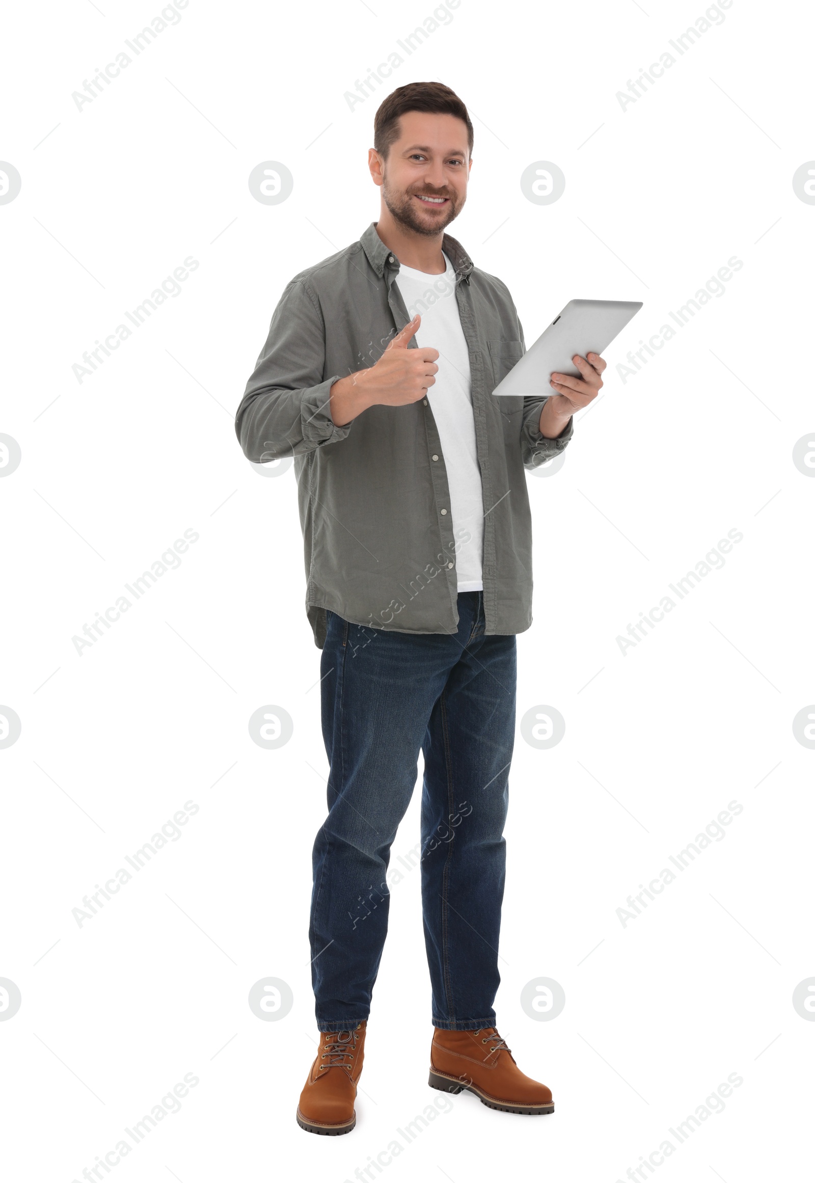 Photo of Happy man with tablet showing thumb up on white background