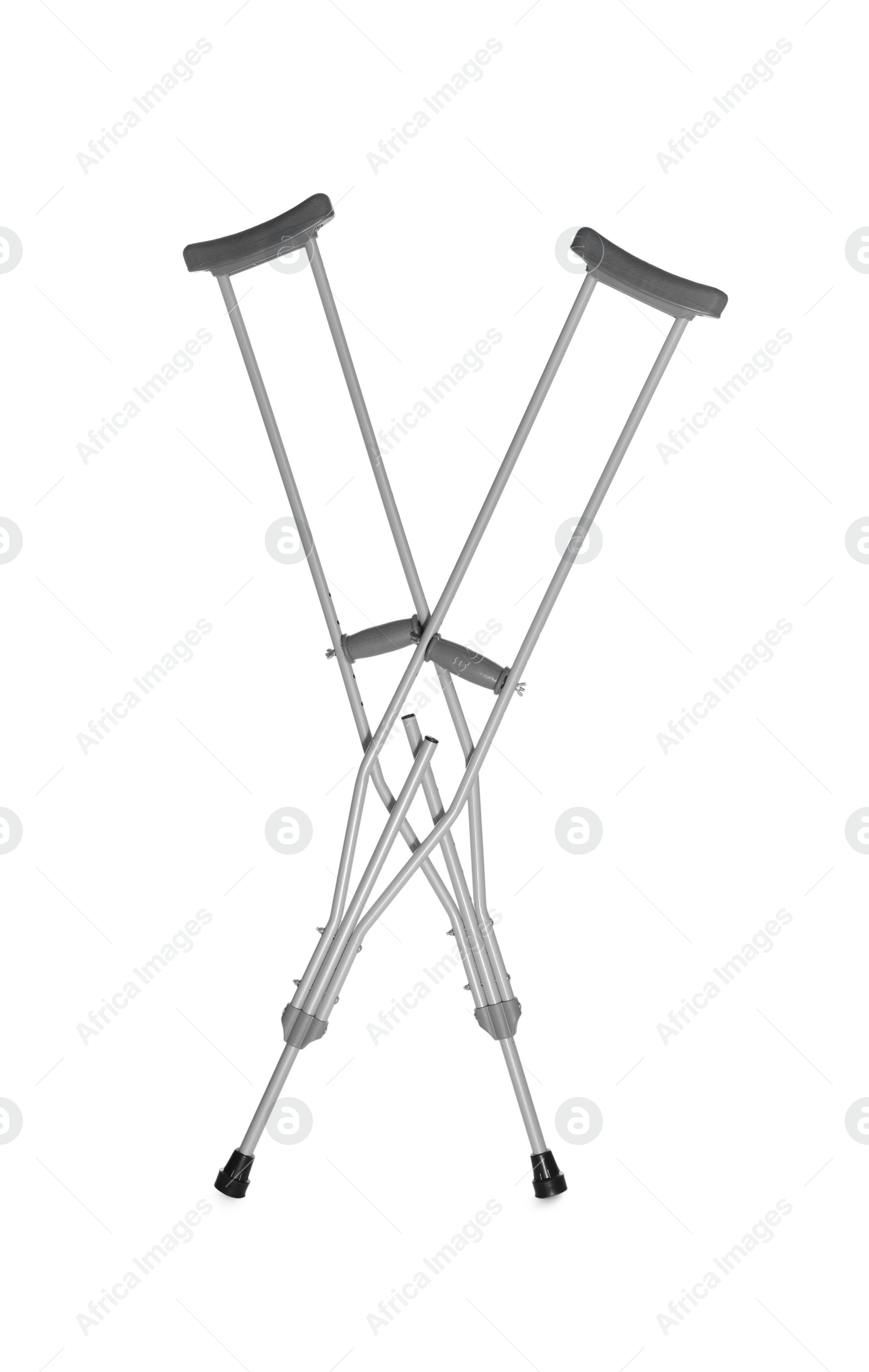 Photo of Pair of axillary crutches on white background