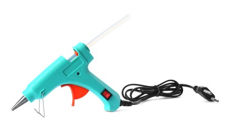 Turquoise glue gun with stick isolated on white