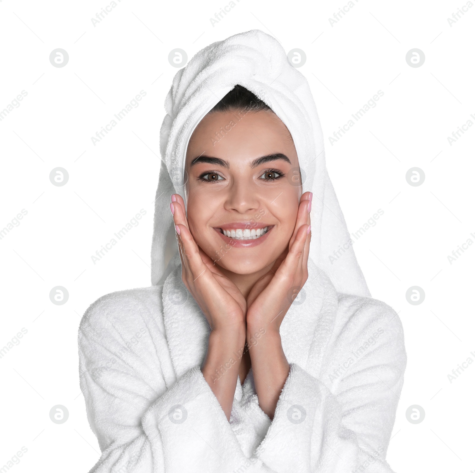 Photo of Beautiful young woman wearing bathrobe and towel on head against white background