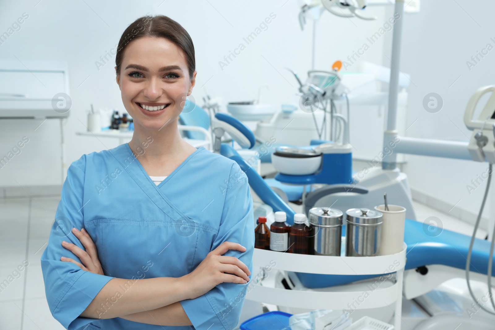 Photo of Portrait of professional dentist at workplace in clinic