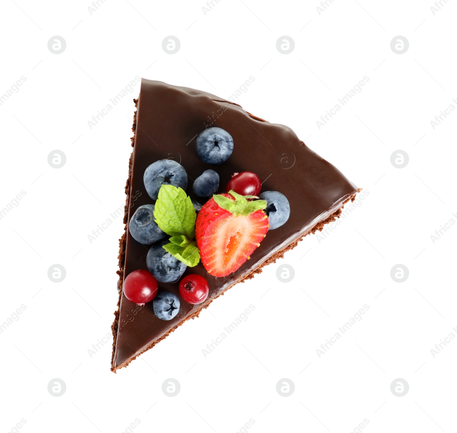 Photo of Slice of chocolate sponge cake with berries on white background, top view