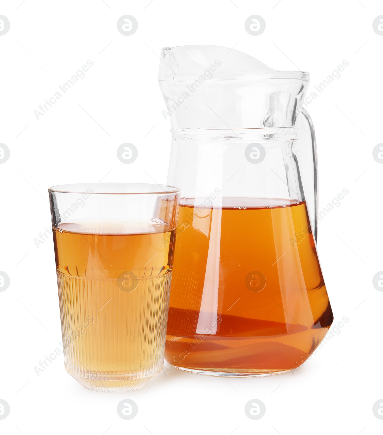 Photo of Tasty kombucha in glass and jug isolated on white
