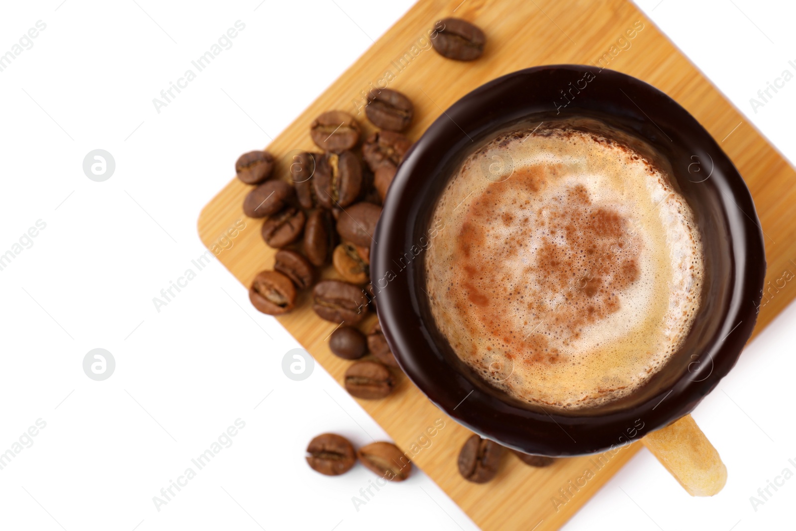 Photo of Delicious edible biscuit cup with coffee and roasted beans on white background, top view. Space for text