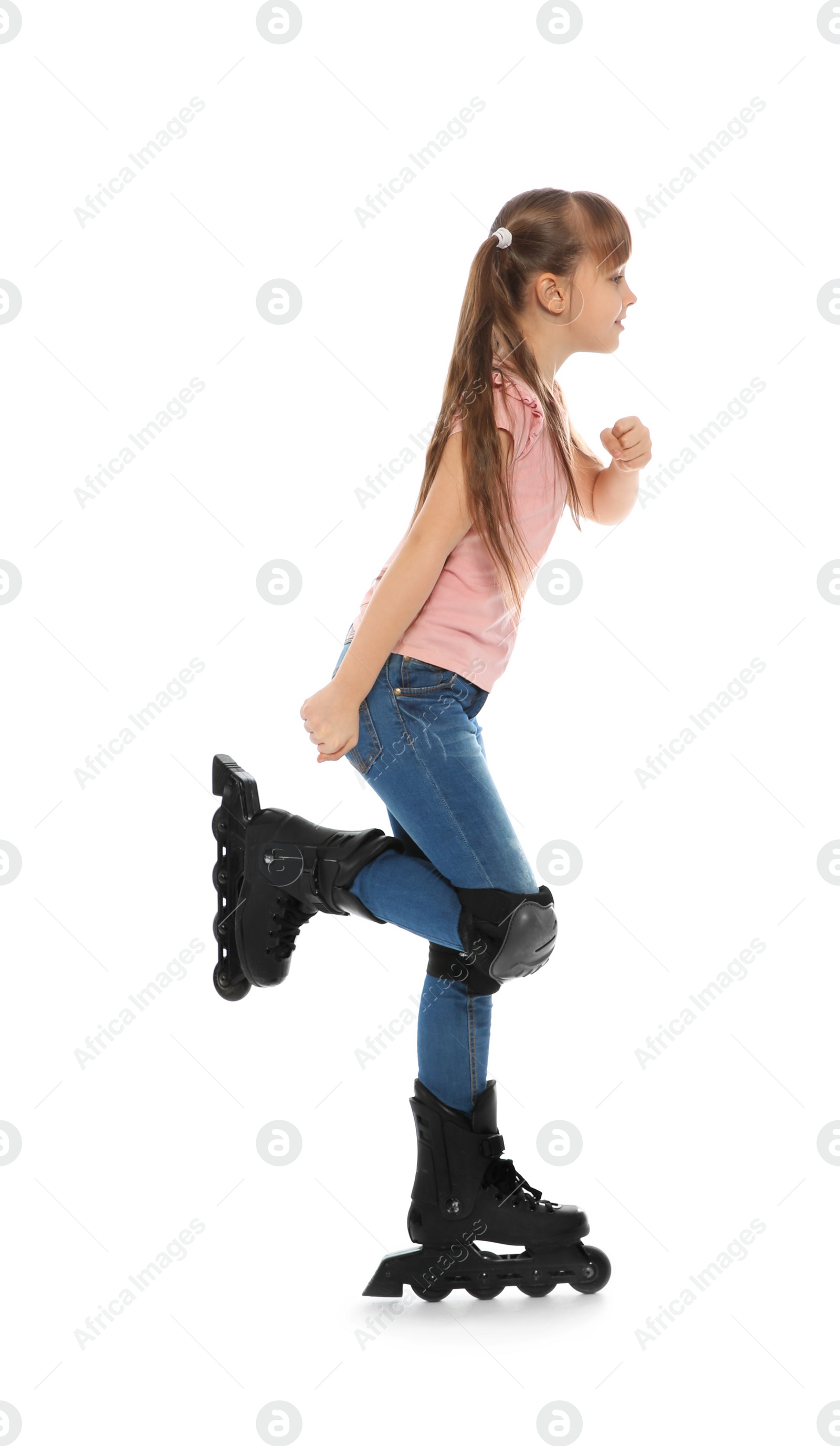 Photo of Little girl with inline roller skates on white background