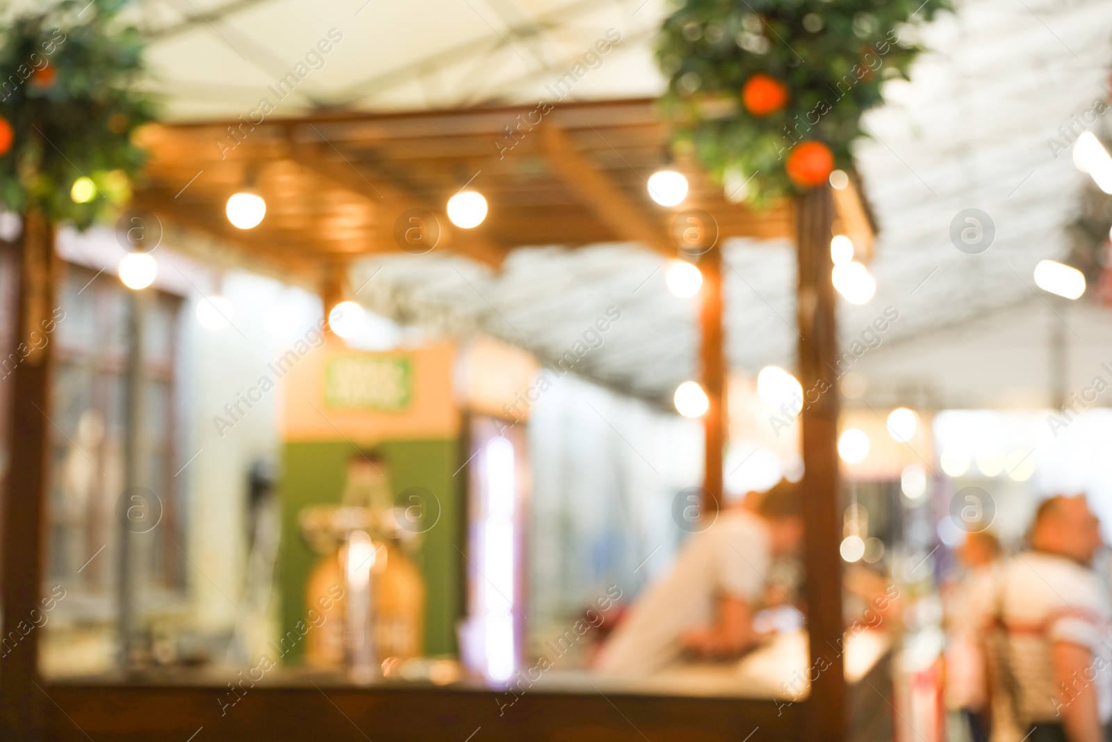 Photo of Blurred view of modern cafe. Bokeh effect