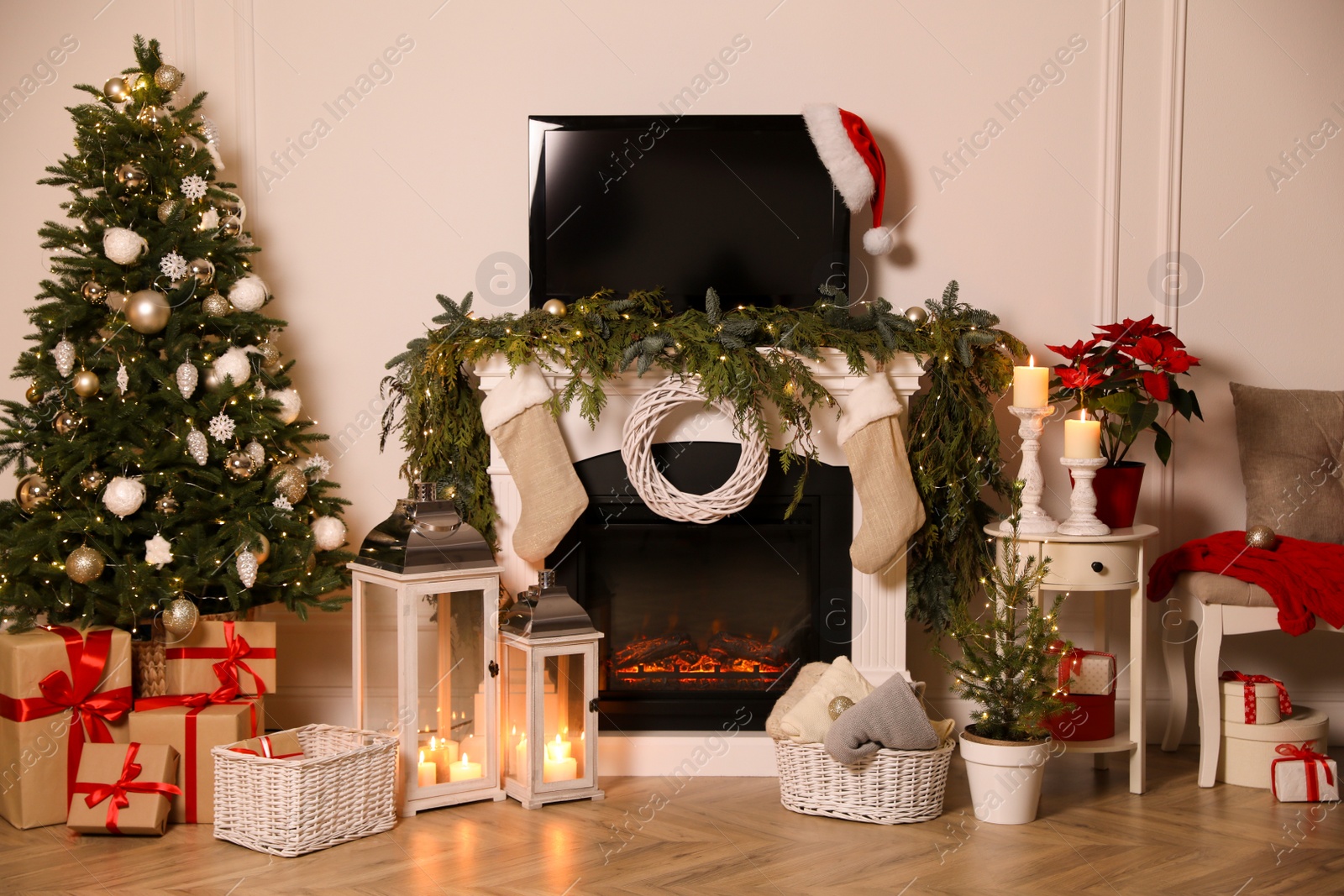 Photo of Beautiful room interior with fireplace and Christmas decor