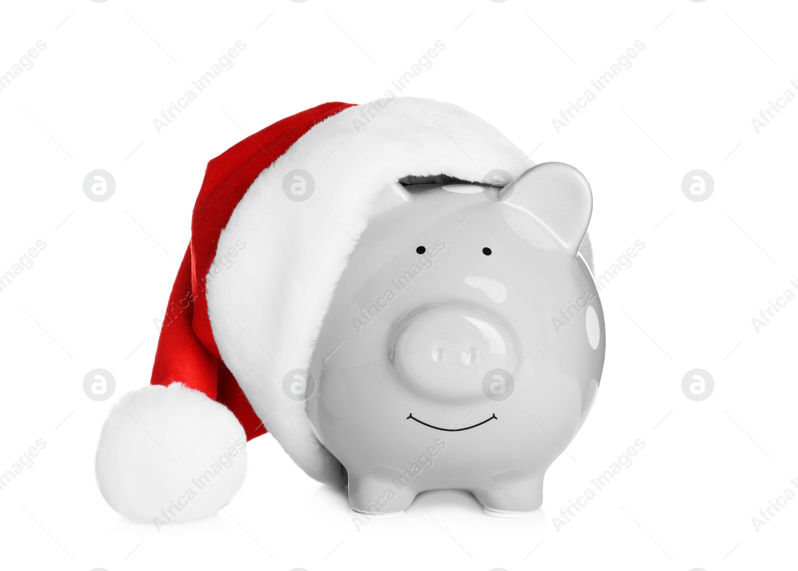 Photo of Cute piggy bank with Santa hat on white background