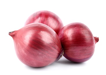 Photo of Fresh whole red onions on white background