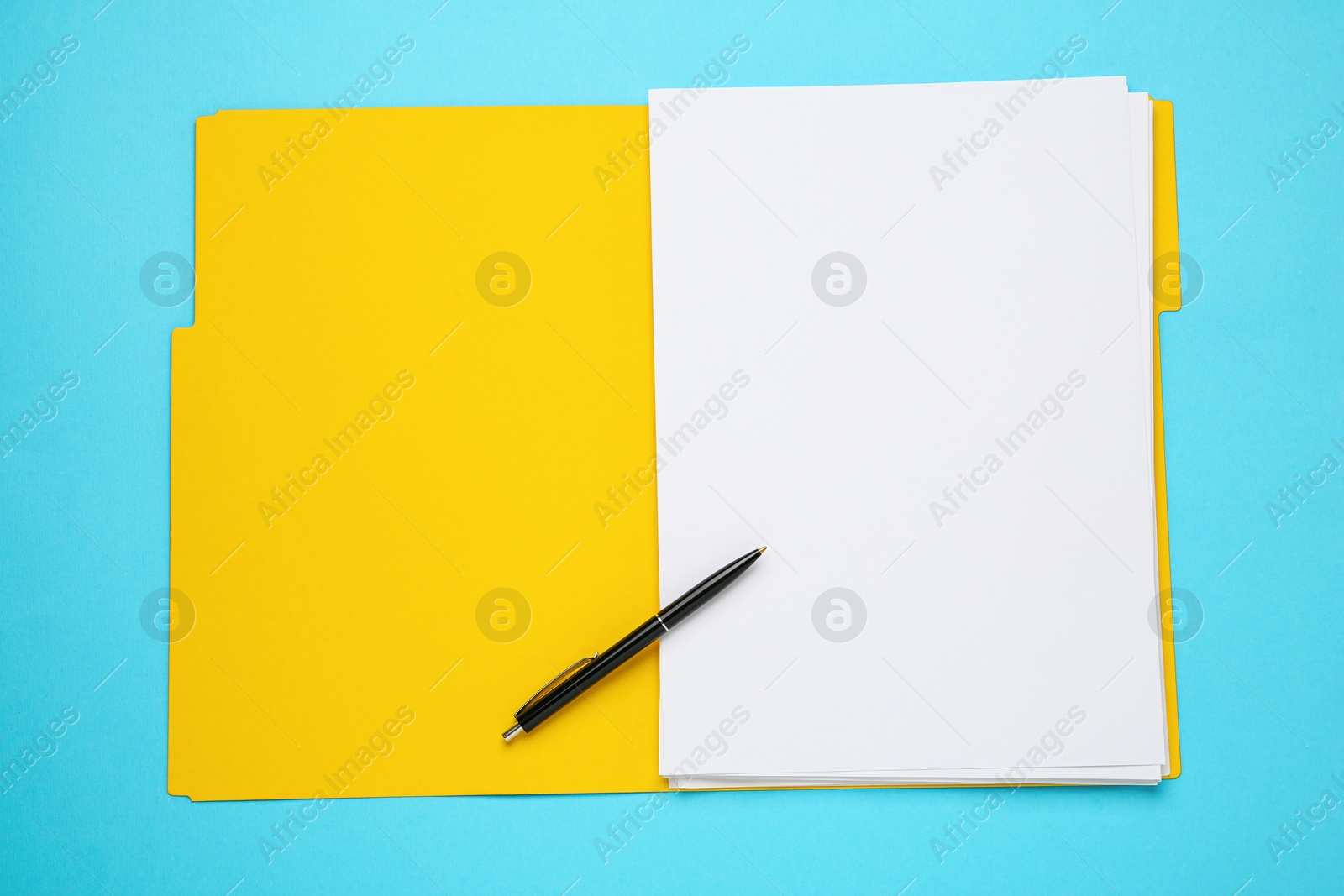 Photo of Yellow file with blank sheets of paper and pen on turquoise background, top view. Space for design