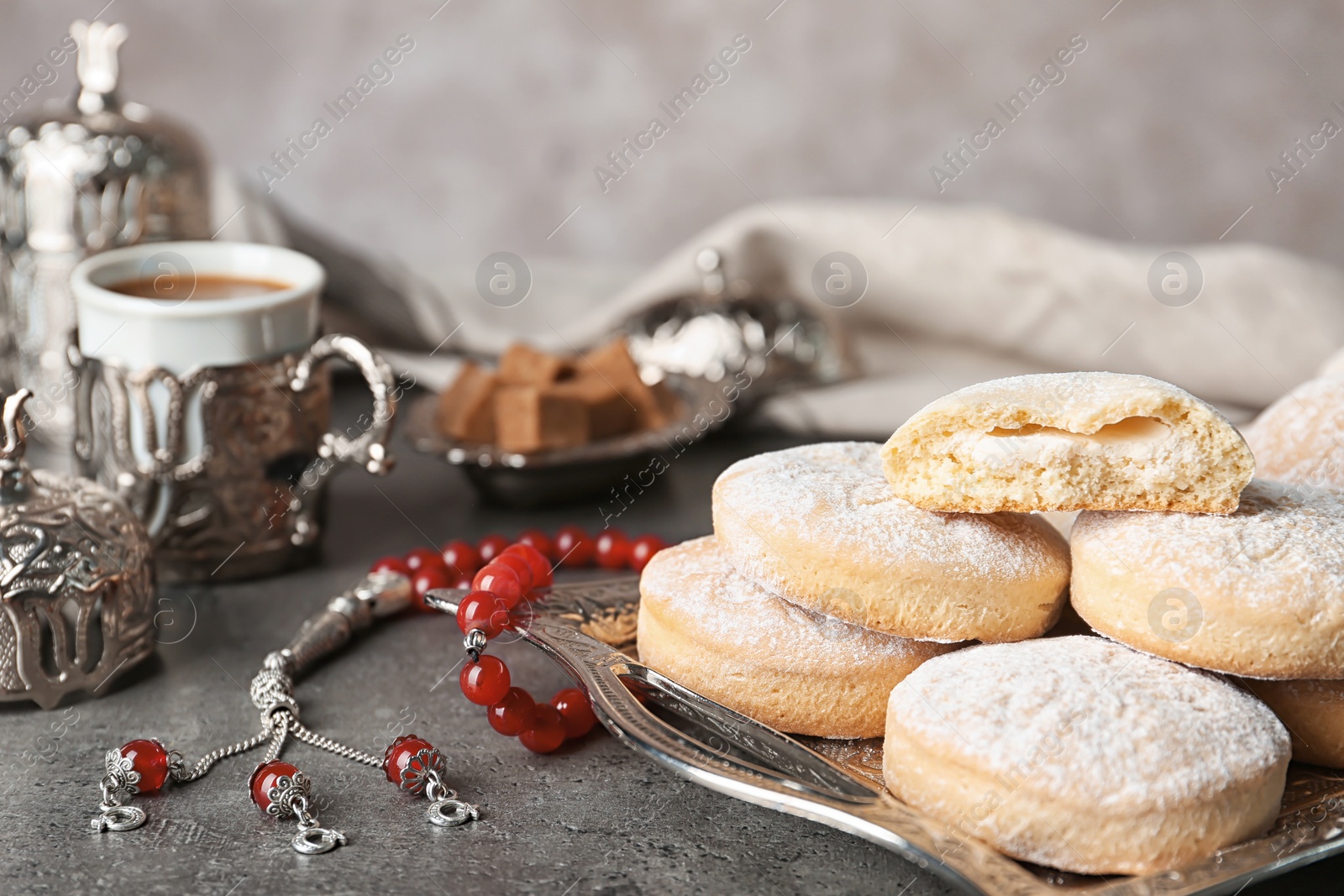 Photo of Composition with traditional cookies for Islamic holidays on table. Eid Mubarak