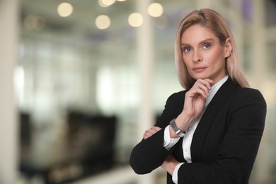 Lawyer, consultant, business owner. Confident woman on blurred background, space for text