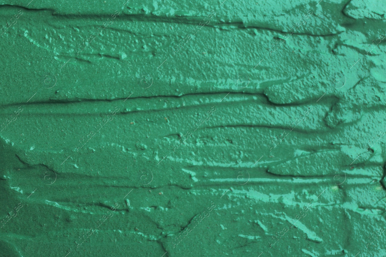 Photo of Natural spirulina facial mask as background, closeup