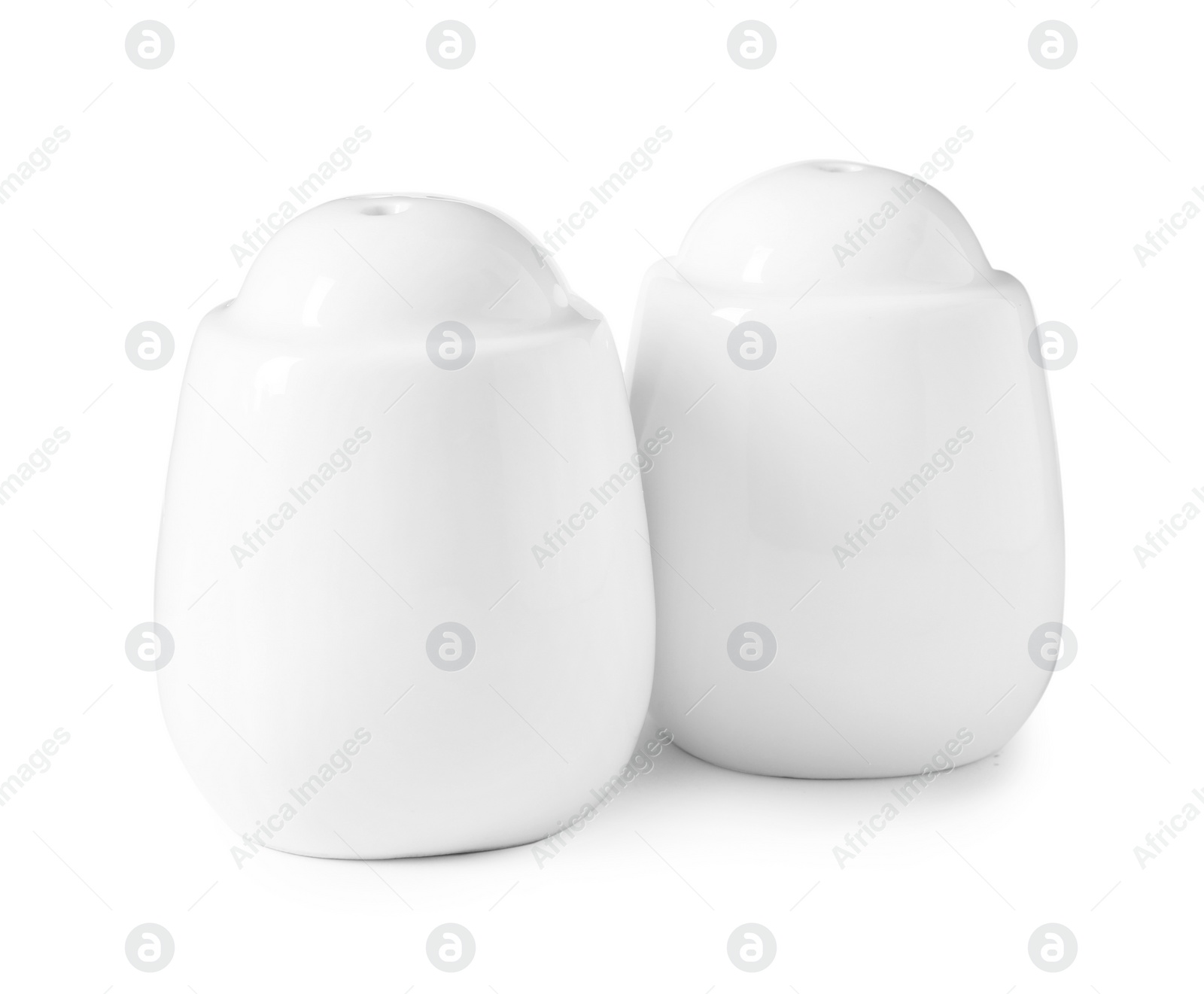 Photo of Salt and pepper shakers isolated on white