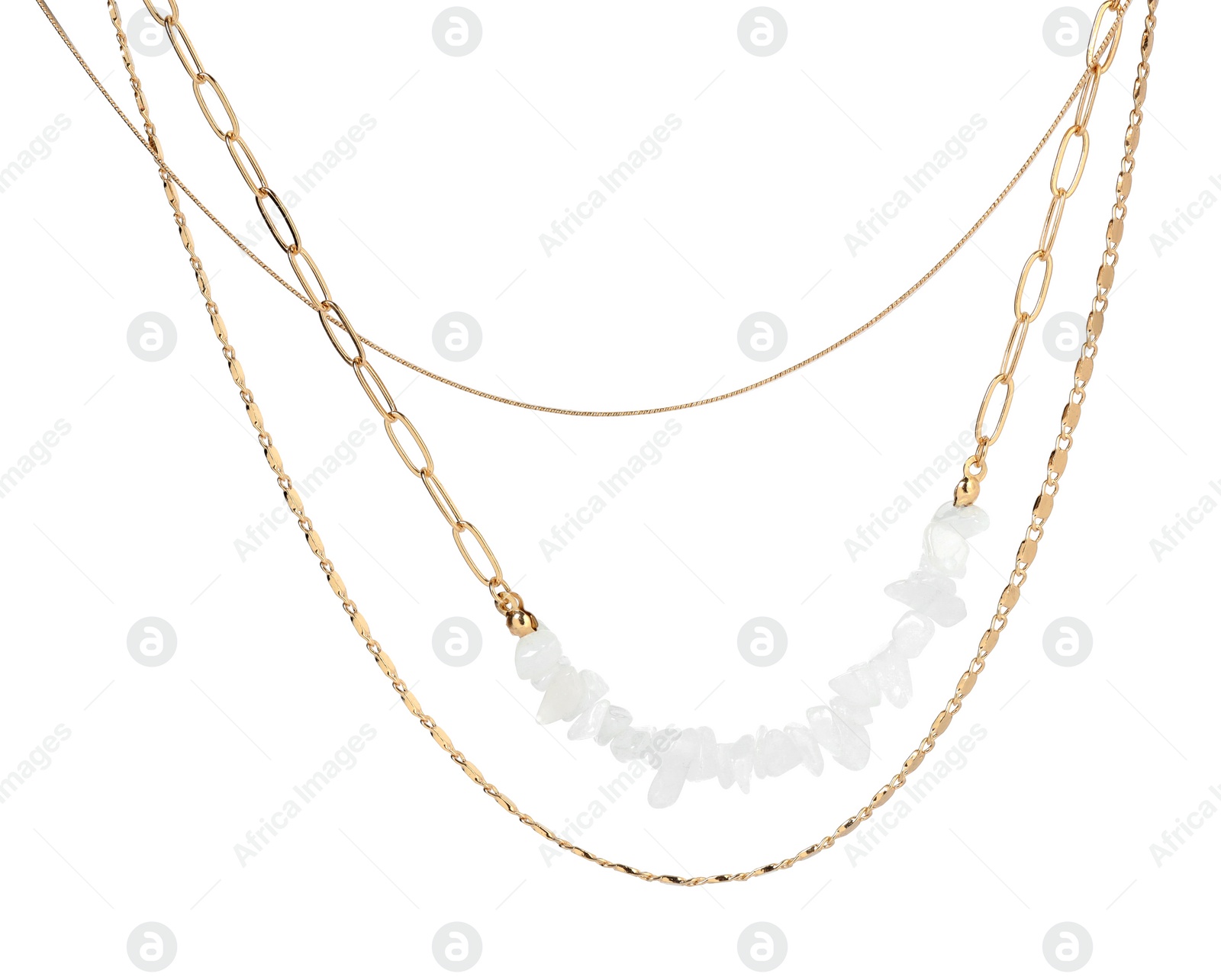 Photo of Metal chains with gemstones isolated on white. Luxury jewelry