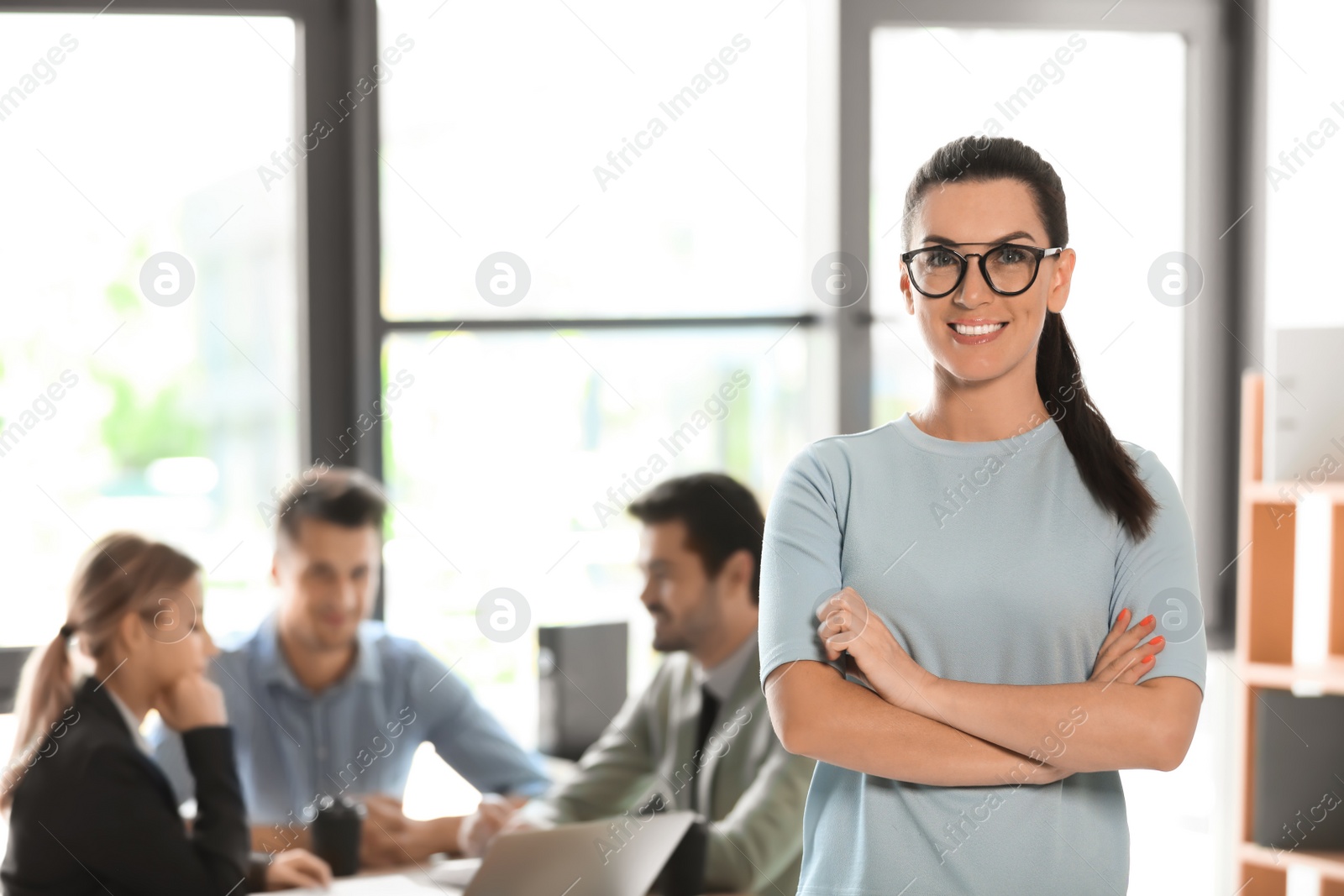 Photo of Office employees having business training at workplace