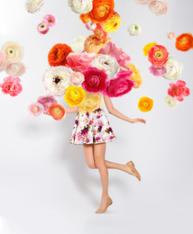 Creative spring fashion composition. Dancing girl and flowers splash