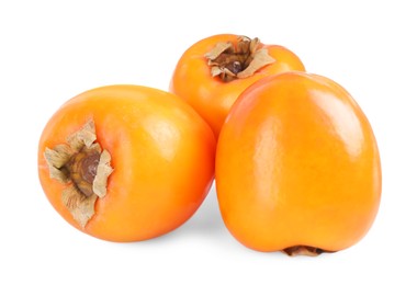 Photo of Delicious ripe juicy persimmons isolated on white