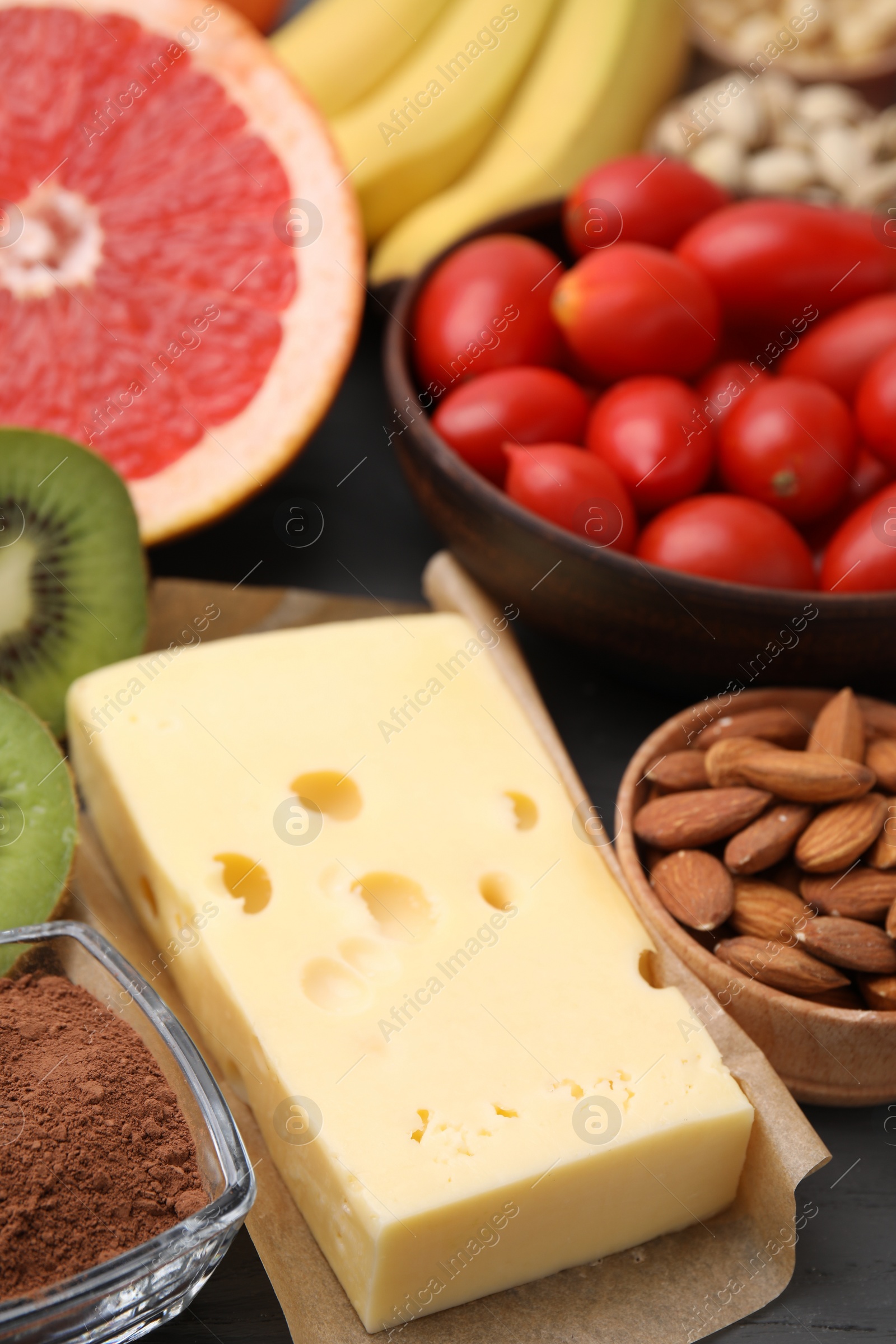 Photo of Many different products on table, closeup. Natural sources of serotonin