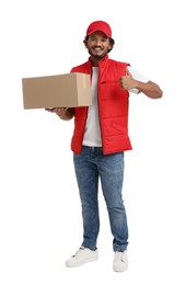 Photo of Happy courier with parcel showing thumb up on white background