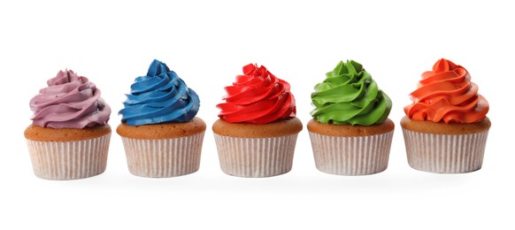 Different delicious colorful cupcakes on white background