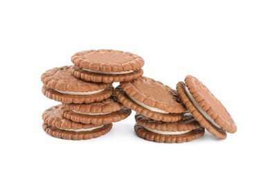 Photo of Tasty chocolate sandwich cookies with cream on white background